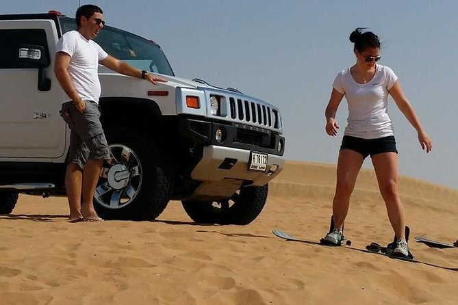 Dubai Desert Morning Tour in 4WD Vehicle: Camel Ride, Quad Bike Tour, Sandboarding, and Camel Farm - Guides, Photos, and the Human Touch