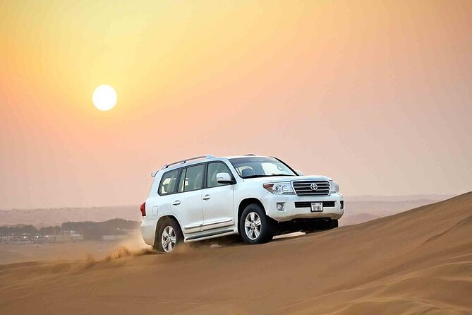 Dubai Desert Safari 20 mins Dune Bashing BBQ Live Show Camel Ride - Camel riding and sandboarding at the desert stop