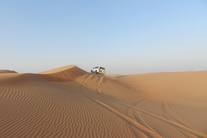 Dubai Desert Safari, ATV open desert, Camel ride, Shows & BBQ - Camel riding, henna, and Arabic camp activities