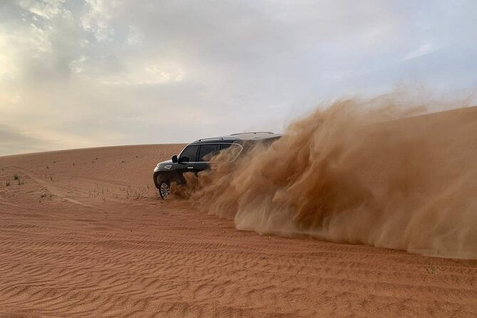 Dubai Desert Safari-BBQ Dinner, Belly Dance, Fire show - A Bedouin camp with familiar desert activities