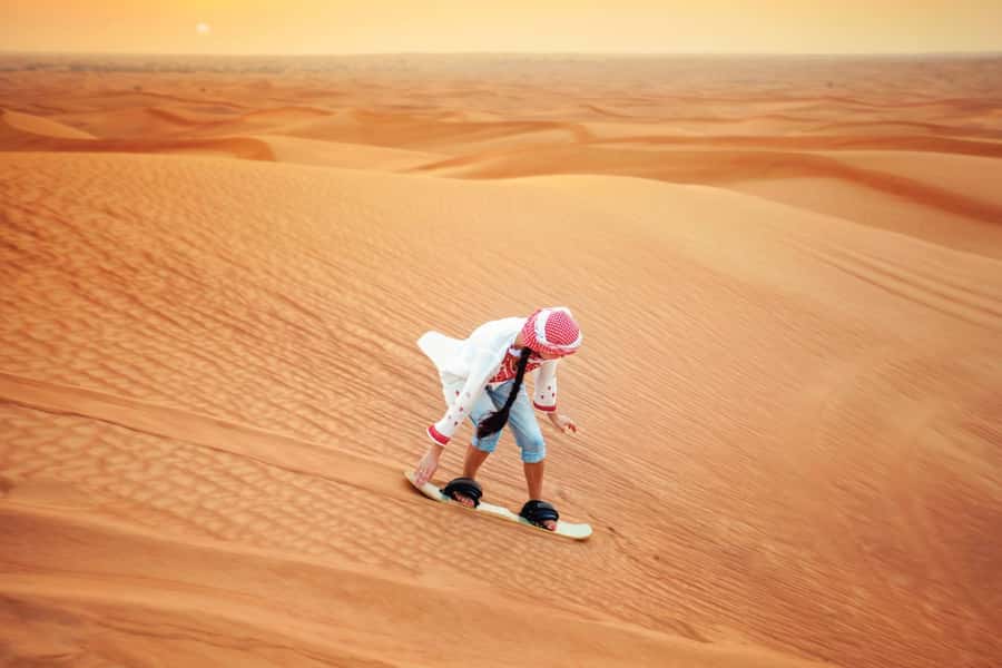 Dubai: Desert Safari, Camel Ride, and BBQ Dinner - Sunset over the sand