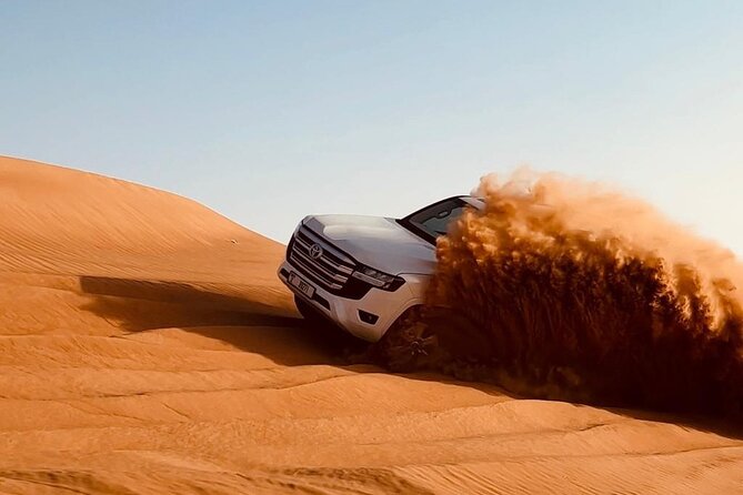 Dubai Desert Safari, Camel Ride, Entertainment Shows & BBQ Dinner - Sandboarding and the Optional Quad Bike