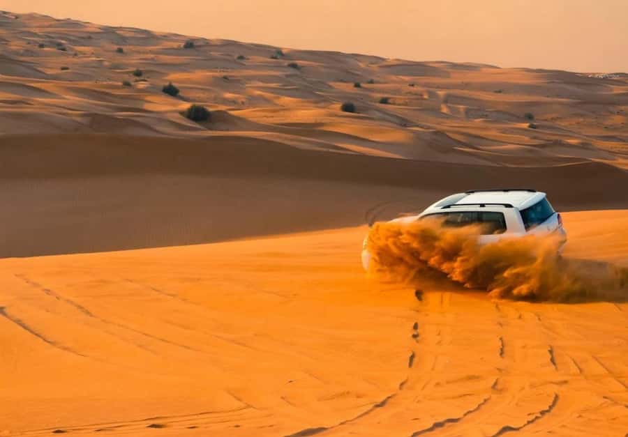 Dubai: Desert Safari, Camel Ride, Sandboard & Buffet Dinner - The 4x4 ride is the main event