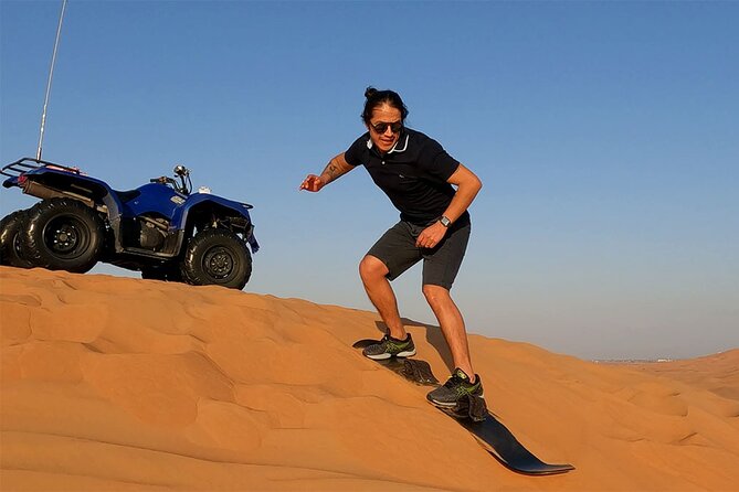 Dubai: Desert Safari, Camel Ride, Show & Optional Dinner - Sandboarding on the Lahbab dunes