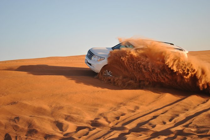 Dubai: Desert Safari, Camel Ride, Show & Optional Dinner - Hotel pickup and the drive out of Dubai