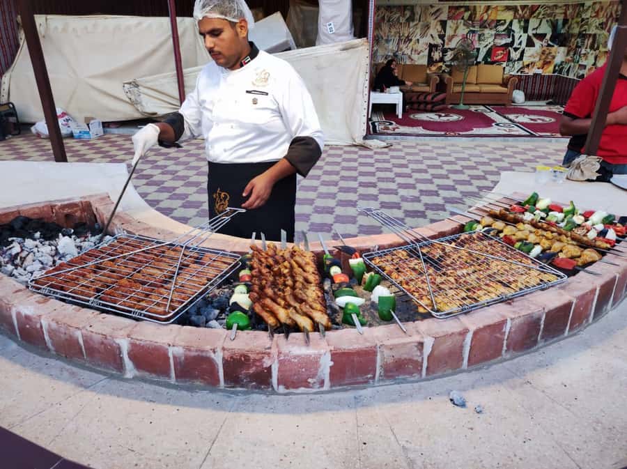 Dubai: Desert Safari Camel Riding, Sandboarding & BBQ Dinner - BBQ dinner and the evening shows