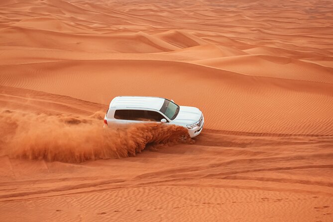 Dubai Desert Safari Dune Bashing, Camel Ride, Sand Boarding, BBQ Dinner. - What a 6.5-hour Dubai desert safari feels like