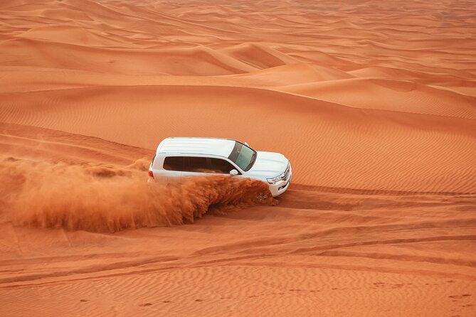 Dubai Desert Safari Dune Bashing, Camel Ride, Sandboarding & BBQ - Why Lahbab’s red dunes make the difference
