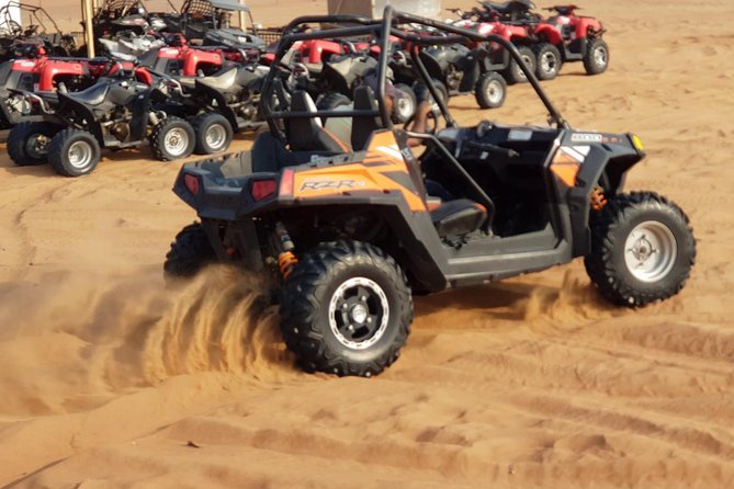 Dubai Desert Safari, Quad Bike, Camel Ride, and Buffet Dinner - Leaving Dubai for the Lahbab dunes