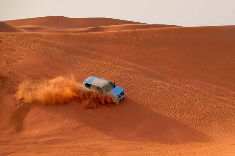 Dubai: Desert Safari, Quad Bike, Sandboarding, Camels & BBQ - The tire-pressure stop and optional quad bikes