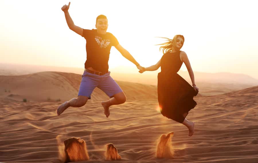Dubai: Desert Safari, Quad Bike, Sandboarding, Camels & BBQ - Arabic coffee, dates, and camp activities
