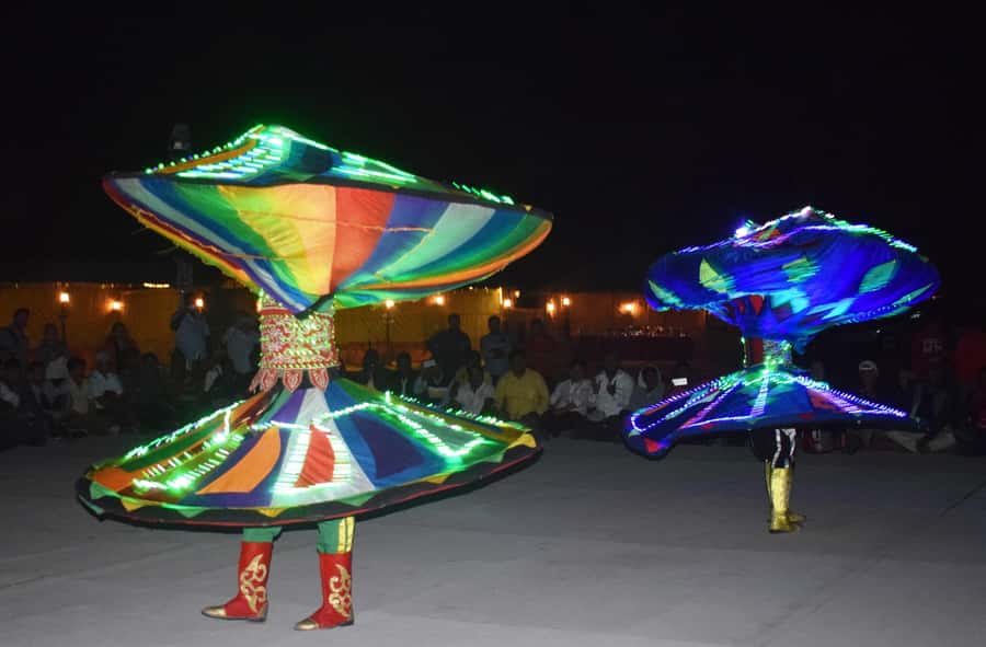Dubai Desert Safari, Quad Biking, Camel Ride, & Sandboarding - Camel riding and the desert camp welcome