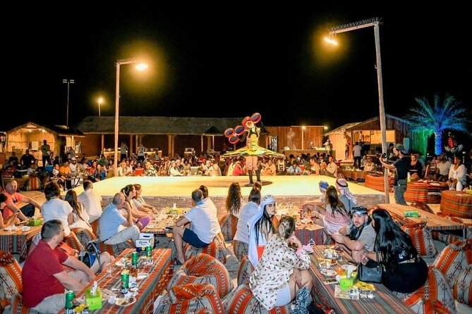 Dubai Desert Safari Thrilling Adventure Unforgettable Experiences - Dinner at camp and the live shows