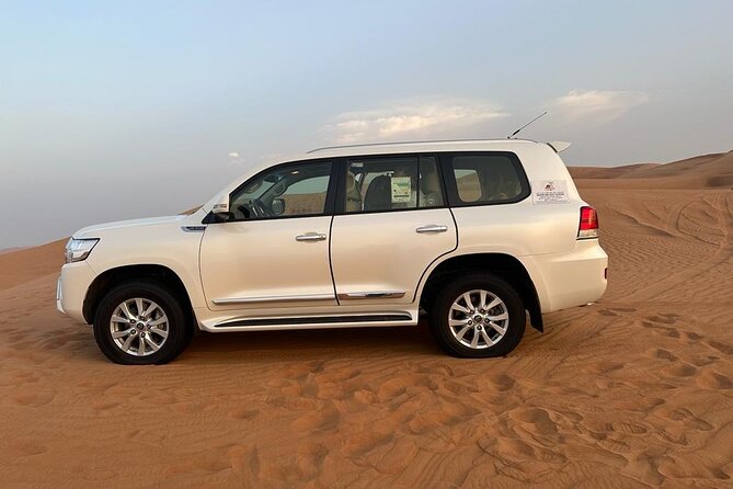 Dubai Desert Safari Thrilling Adventure Unforgettable Experiences - The guide can make or break the day