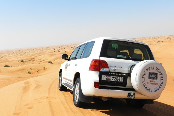 Dubai Desert Safari with BBQ, 3 Shows & Camel Ride at Majlis Camp - From Dubai hotel pickup to the open desert