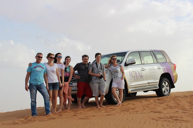 Dubai Desert Safari with BBQ And 4W Land Cruiser Dune Bashing Experience - Sunset photography on the sand