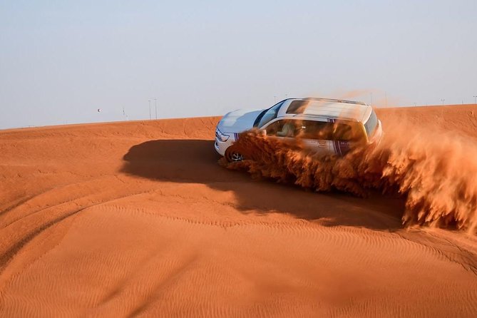 Dubai Desert Safari with BBQ and 4WD Land Cruiser Dune Bashing - Arabic coffee, dates, and the Royal Adventure camp