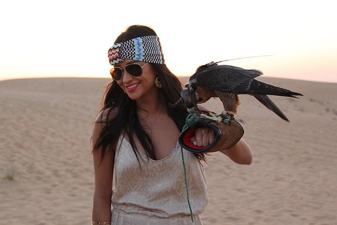 Dubai Desert Safari with BBQ and 4WD Land Cruiser Dune Bashing - Sunset photos and a short camel ride