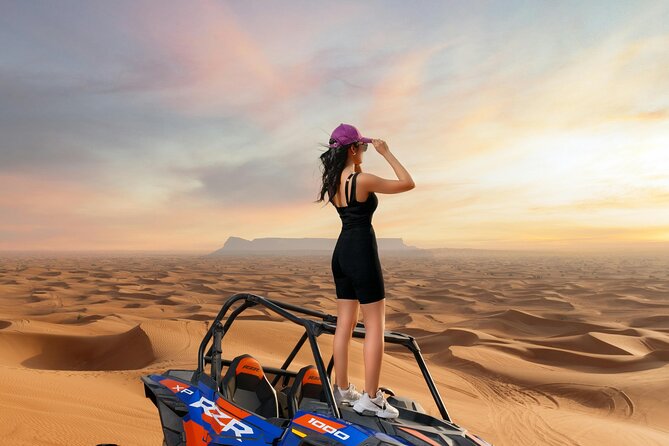Dubai Desert Safari with BBQ Dinner and Live Shows - Sandboarding and sunset photos add variety