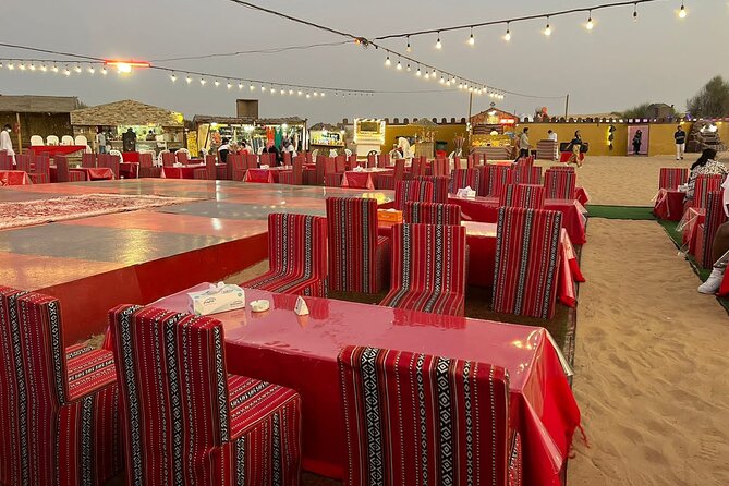 Dubai Desert Safari with BBQ Dinner in red sand - Camel ride, falcon contact and camp customs
