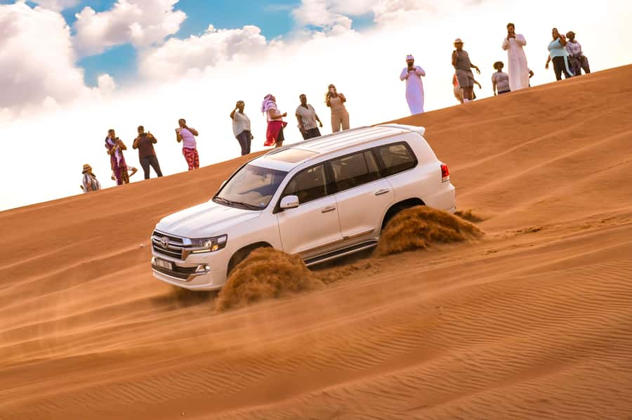 Dubai: Desert Safari with BBQ Dinner & Quad Biking Options - Red-gold dunes, photo stops, and sandboarding
