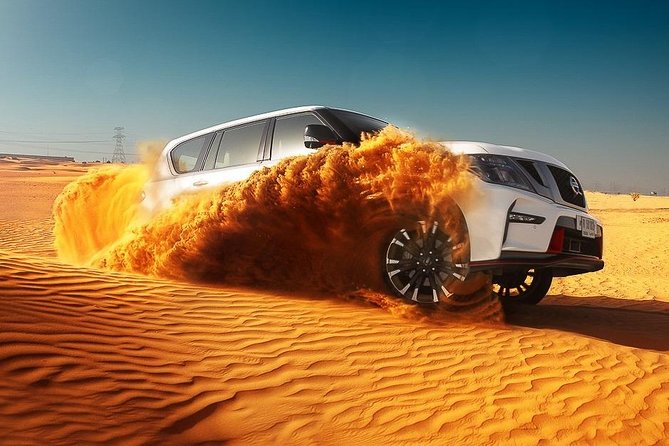 Dubai Desert Safari With BBQ, Quad Bike And Camel Ride - Sandboarding and the red-dune photo stops