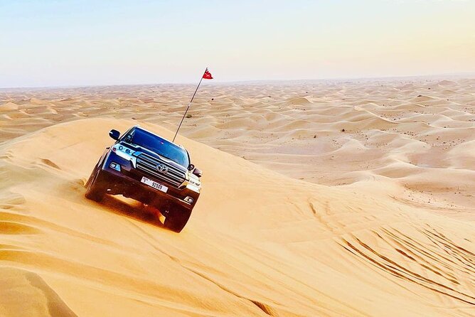 Dubai Desert Safari with BBQBuffet, Dune Bashing, Boarding, Camel - Sandboarding from the high dunes