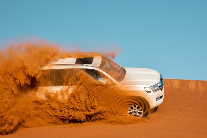 Dubai Desert Safari with Belly Dance, Fire Show and Tanura Show-The Full Package - Lahbab dunes turn the transfer into the main event