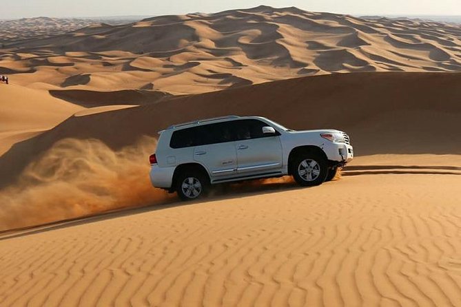 Dubai: Desert Safari with Camel Ride & Dune Bashing - Camel riding in the style of Bedouin travel