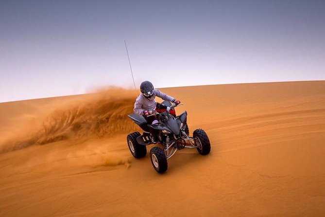 Dubai: Desert Safari with Camel Ride & Dune Bashing - A Bedouin-style camp with coffee, dates, and henna