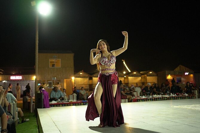 Dubai Desert Safari with Camel Riding, Sandboarding & Dinner - Three live shows after dark