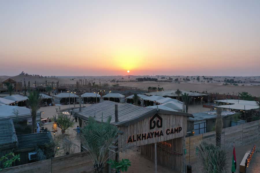 Dubai: Desert Safari with Camp, Dinner, & Optional Overnight - Sandboarding and the guaranteed sunset stop