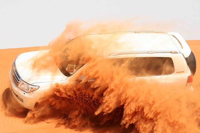 Dubai Desert Safari with Dinner in PRIVATE 4x4 Vehicle - BBQ buffet, soft drinks, and three evening shows