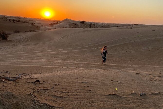 Dubai Desert Safari With Dune Bashing, Camel Ride & BBQ Dinner - Belly dance, Tanoura, and fire shows