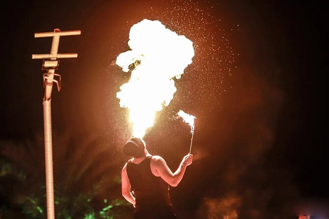 Dubai Desert Safari with Dune Bashing & Live Shows - Sandboarding on a high dune