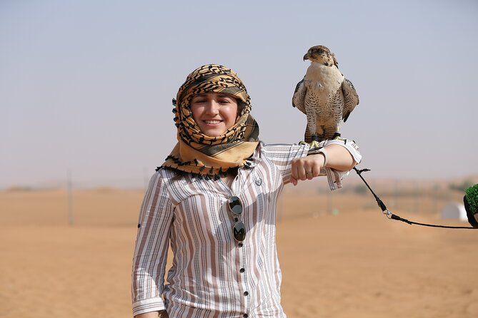 Dubai Desert Safari with Quad Bike, Dune Bashing, Camel Ride, Sand Boarding &BBQ - Camel riding is brief but adds local character