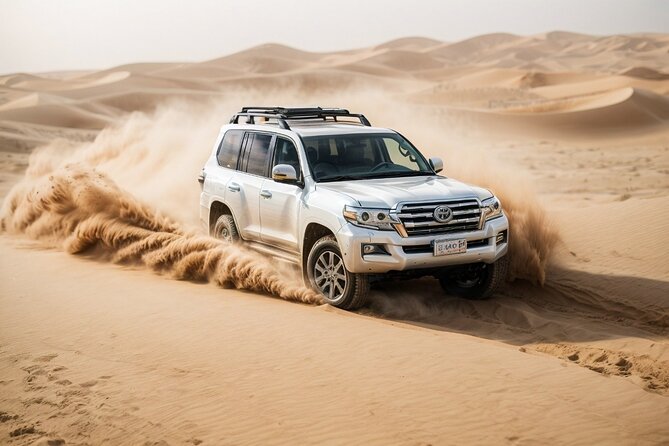Dubai Desert Safari with Quad Bike, Sand Boarding & BBQ Dinner - Riding through Lahbab by Land Cruiser
