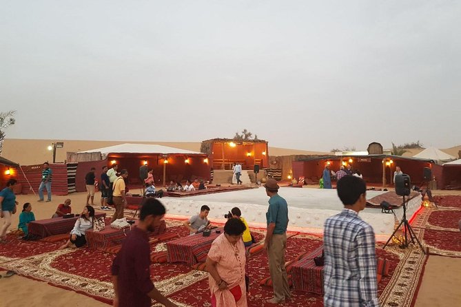 Dubai Desert Safari with Quad Bike, sandboarding, live show & BBQ - The desert camp welcome and short camel ride