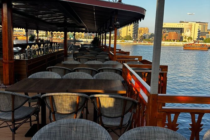 Dubai Dhow Cruise Dinner Al Seef Creek Multicusine - Tanora dance and the puppet show
