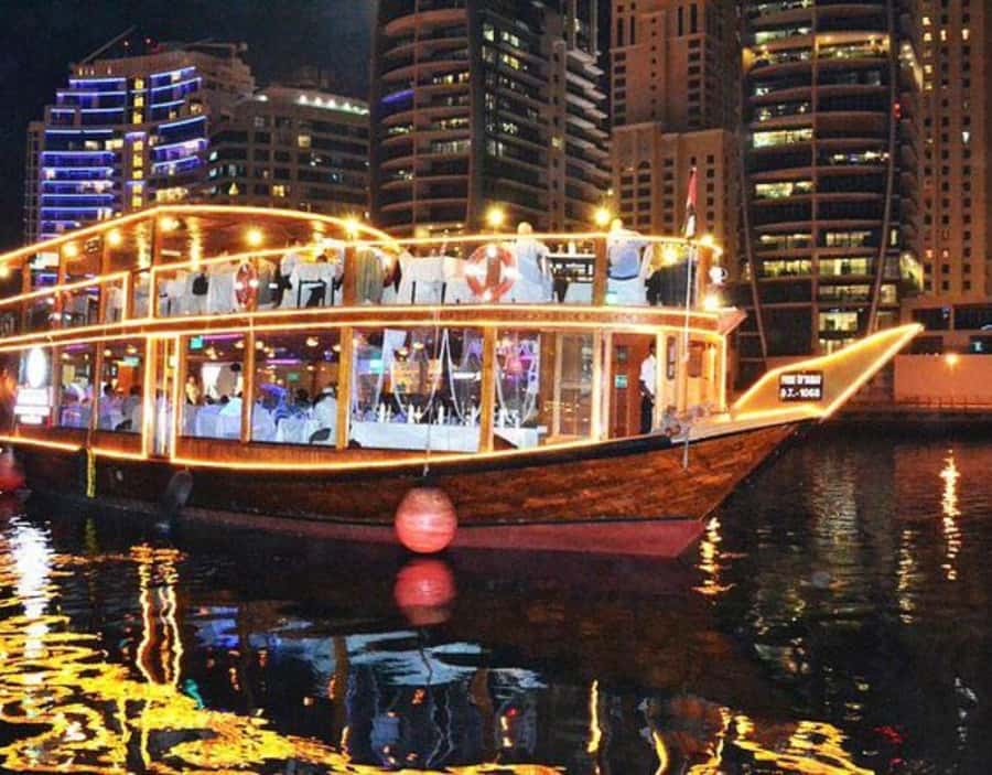 Dubai: Dhow Dinner Cruise on Creek or Marina with Live Shows - Choosing between Dubai Creek and Dubai Marina