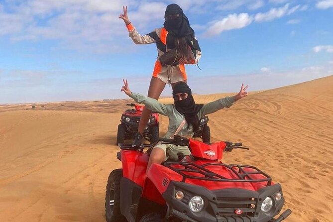 Dubai Dinner Desert Experience with 01 Hour quad bike and camel ride - Safety briefing before the quad bikes