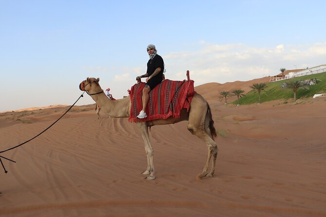 Dubai: Dune Buggy Safari and Camel Ride with Transportation - Getting ready at the private base camp