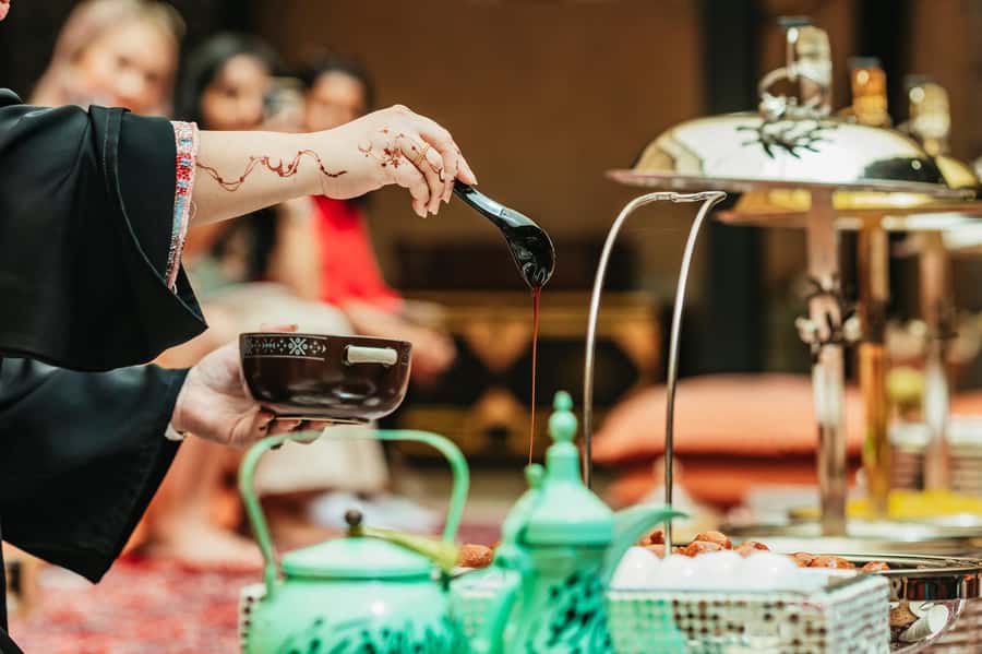 Dubai: Emirati Cultural Breakfast Experience - Sitting on floor cushions in a traditional courtyard