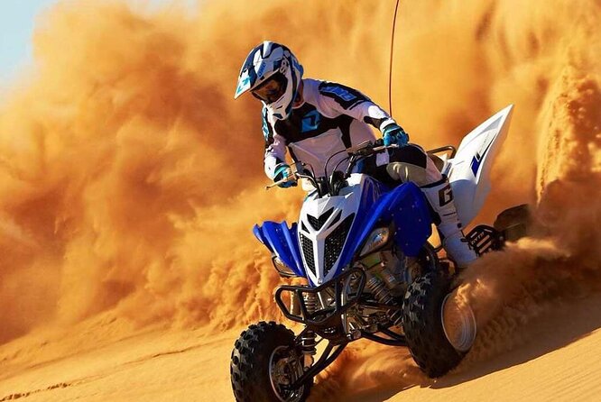 Dubai Evening 4x4 Desert Safari ATV Bike ,Camel Ride , BBQ Dinner - Dune bashing: the loud, fast centerpiece