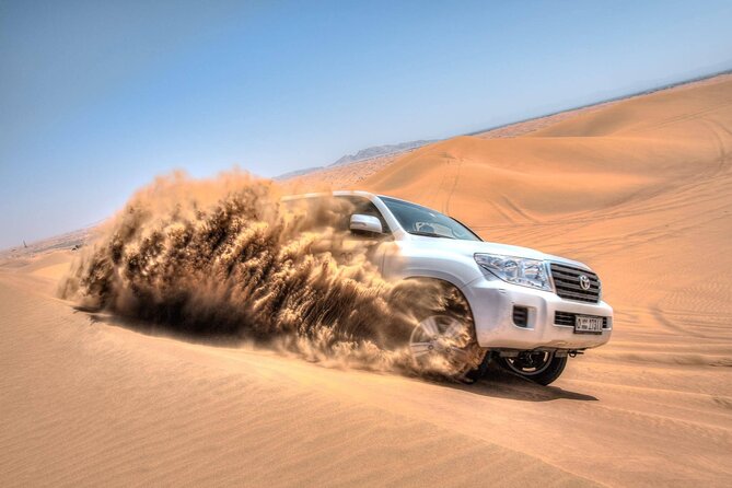Dubai Evening Desert Safari & BBQ Dinner - Belly dancing, tanura, and fire performance