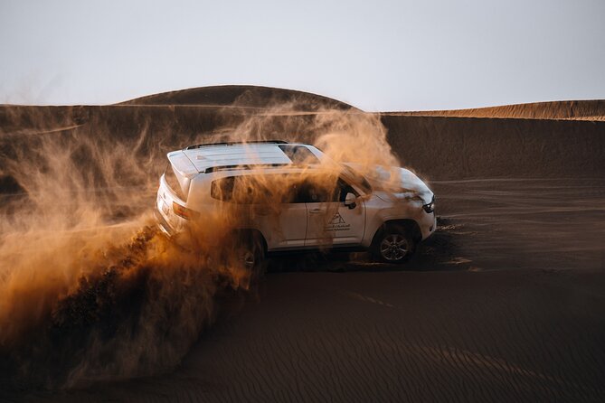 Dubai Evening Desert Safari: Sandboarding, BBQ, Camel Ride & more - Leaving Dubai for the dunes at 3:30 pm