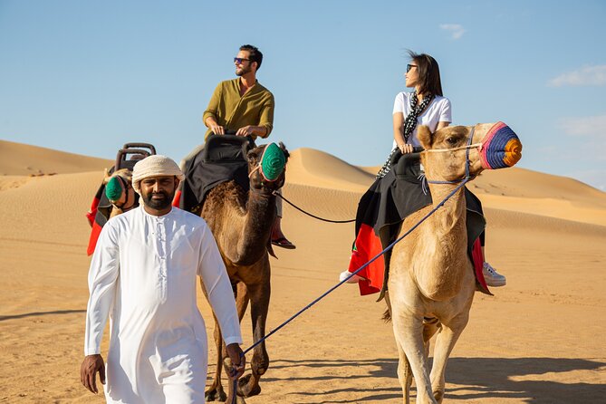 Dubai Evening Desert Safari: Sandboarding, BBQ, Camel Ride & more - Dinner under the stars at the Bedouin-style camp