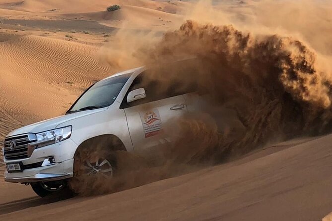 Dubai Evening Desert Safari with BBQ & Live Entertainment - From Dubai streets to Lahbab’s Red Desert