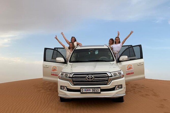 Dubai Evening Desert Safari with BBQ & Live Entertainment - Sunset from the top of a dune