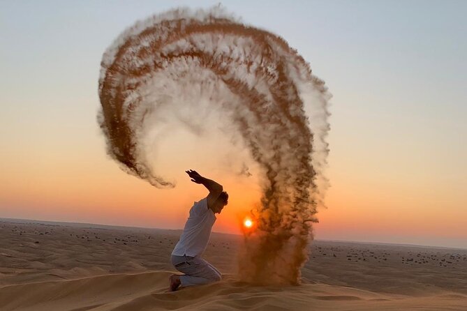 Dubai Evening Desert Safari with BBQ & Live Entertainment - Sandboarding and a short camel ride